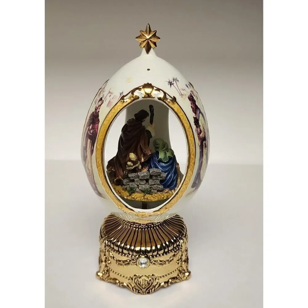 Home For The Holiday Porcelain Egg-Shaped Musical Box Revolving Nativity/Santa
